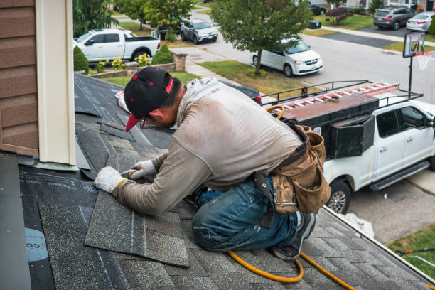 Professional Roofing technician working in New Castle, VA